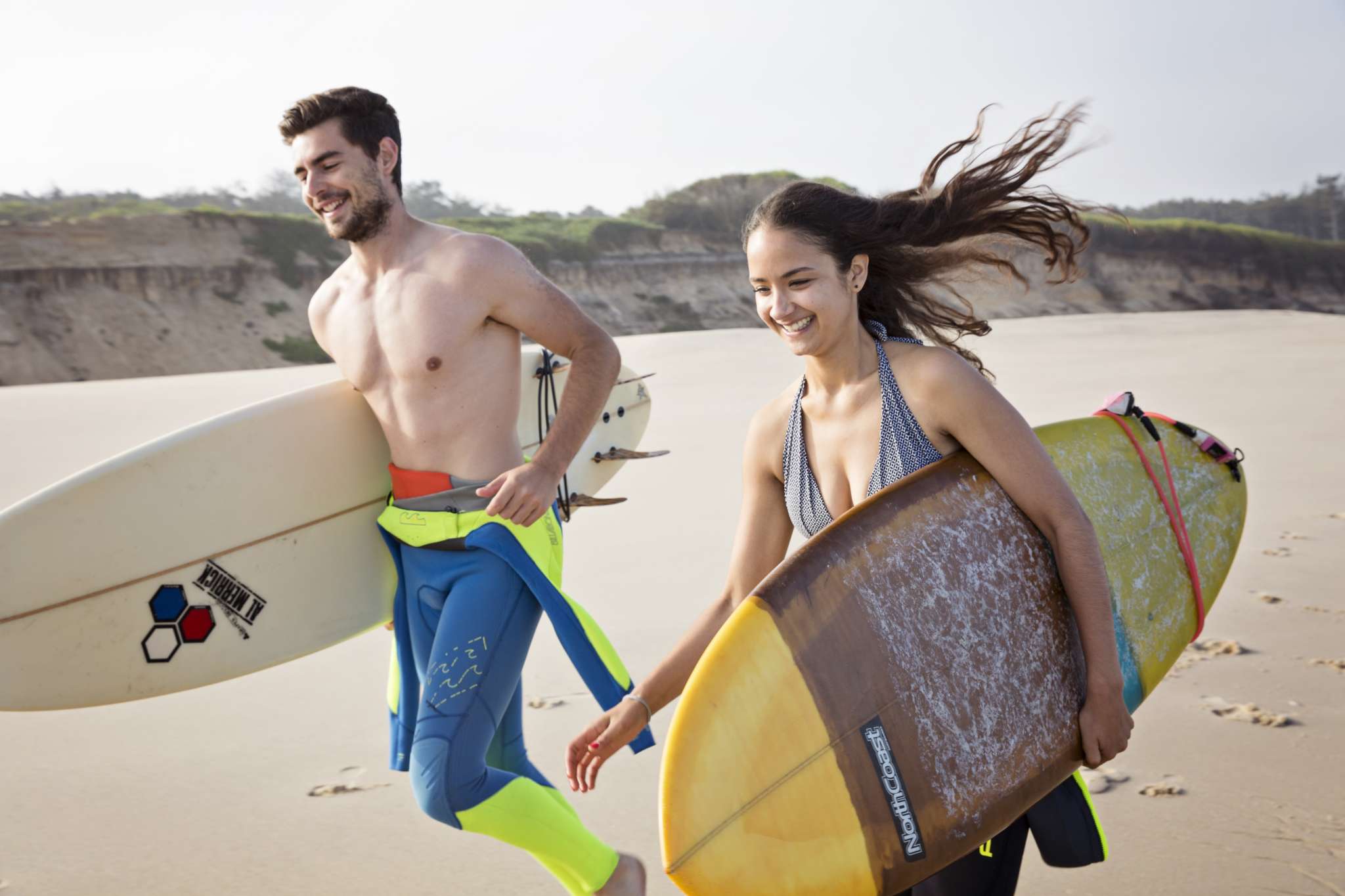 Couple Smile Surfboards Run